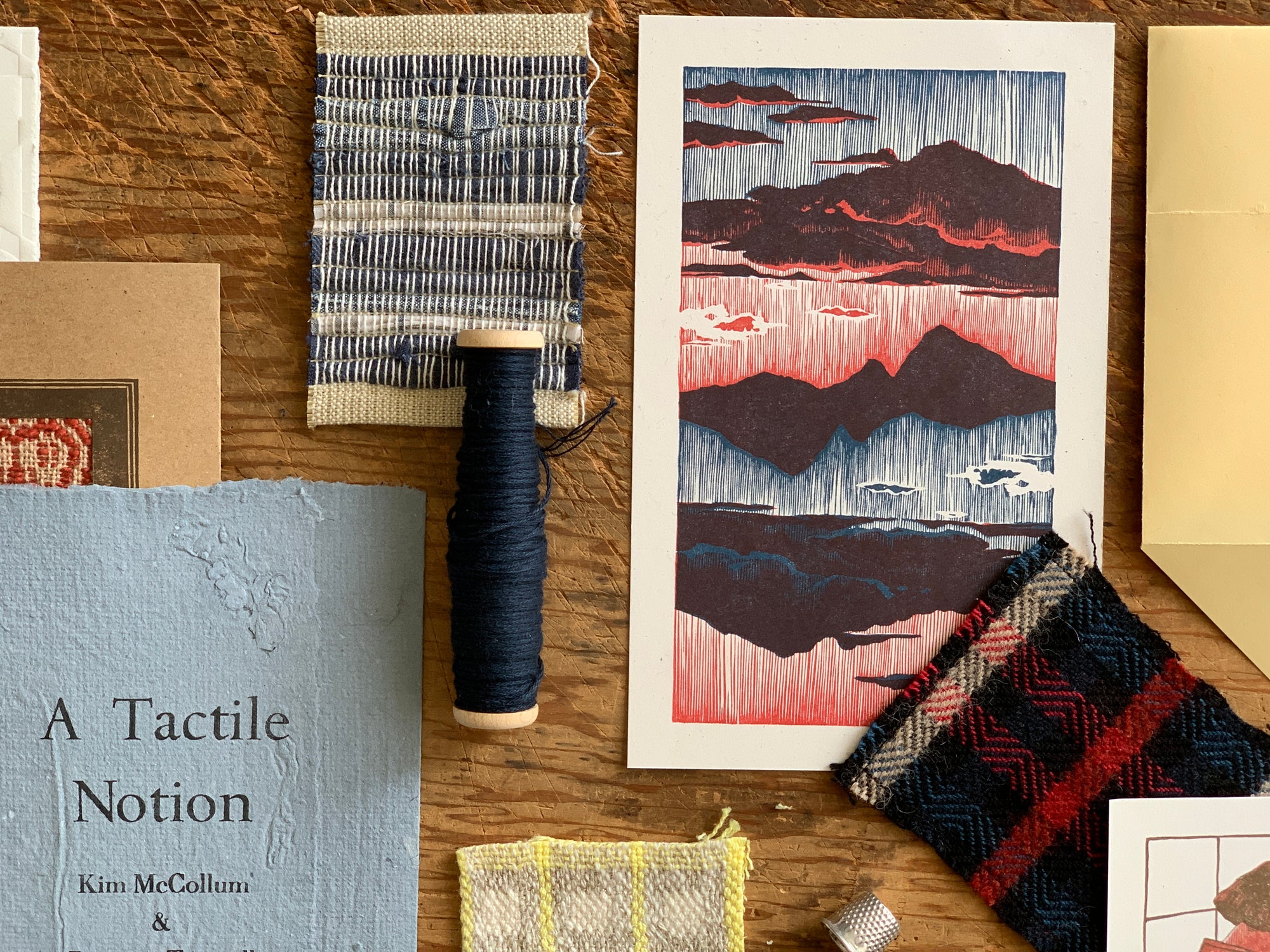 A Tactile Notion: Handwoven samples and lino print by Kim McCollum and Brianna Tosswill